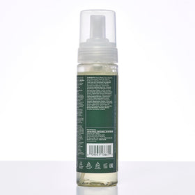 Tea Tree aerosol dispensing mousse into palm illustrating easy application and controlled amount
