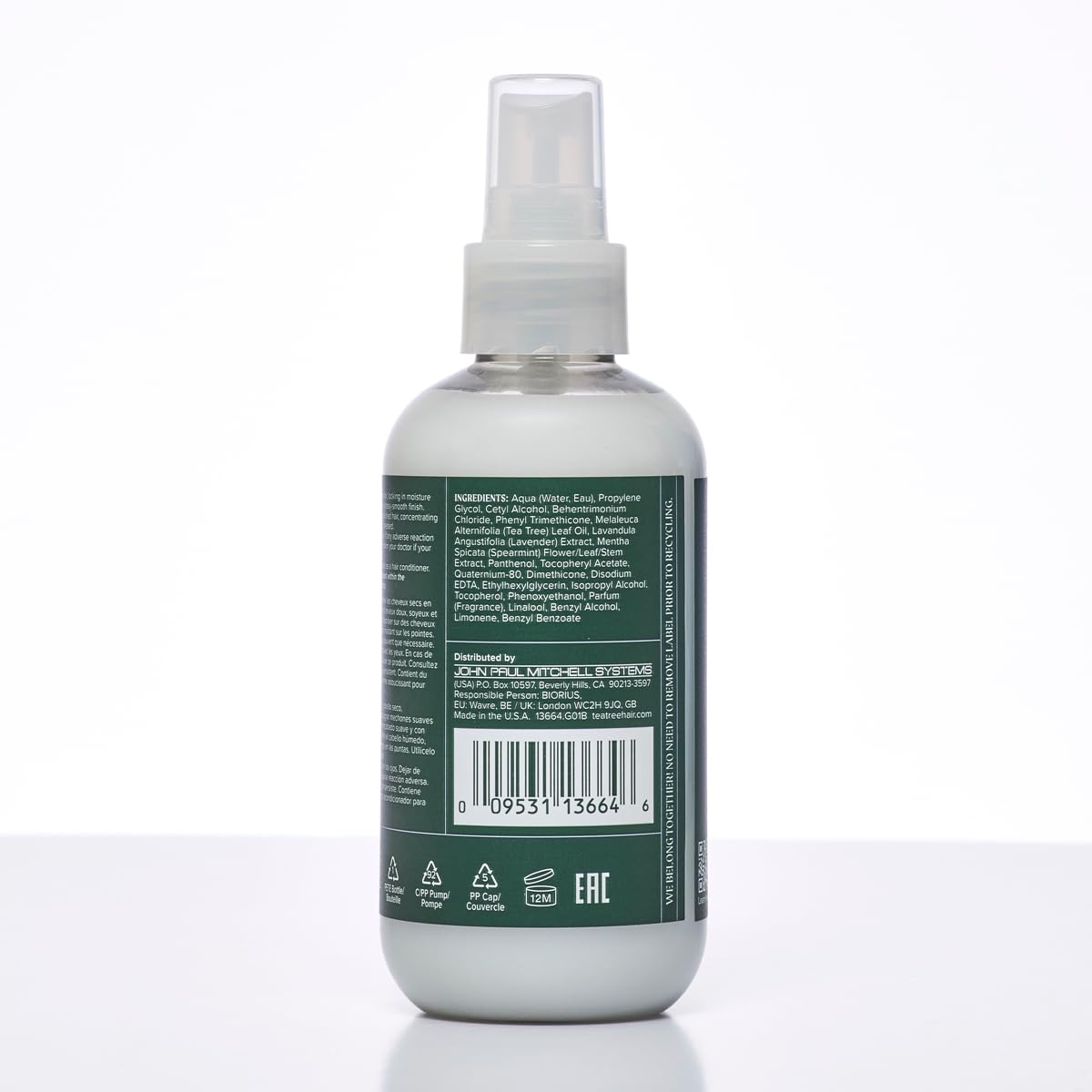 Tea Tree bottle on bathroom shelf with plants showing calming spa-like benefit