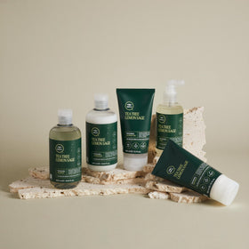 Tea Tree next to ruler shows 6.8 fl oz size and travel-friendly bottle