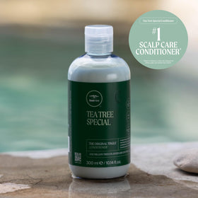 Tea Tree lifestyle bathroom shelf display, suggests everyday salon-quality routine
