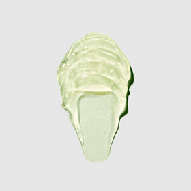 Tea Tree pomade label close-up highlighting ingredients and conditioning benefit