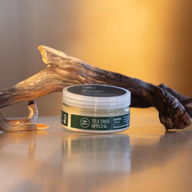 Tea Tree jar on bathroom counter suggesting salon-quality routine