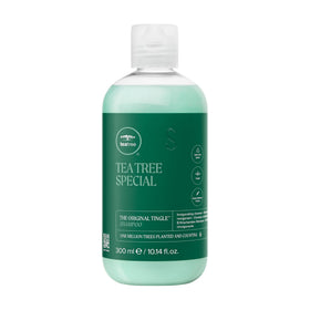 Tea Tree front bottle showing brand and product, conveys fresh scalp benefit