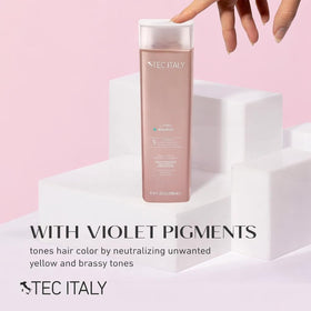 Tec Italy bottle in hand showing 10.14 fl oz scale and portability benefit