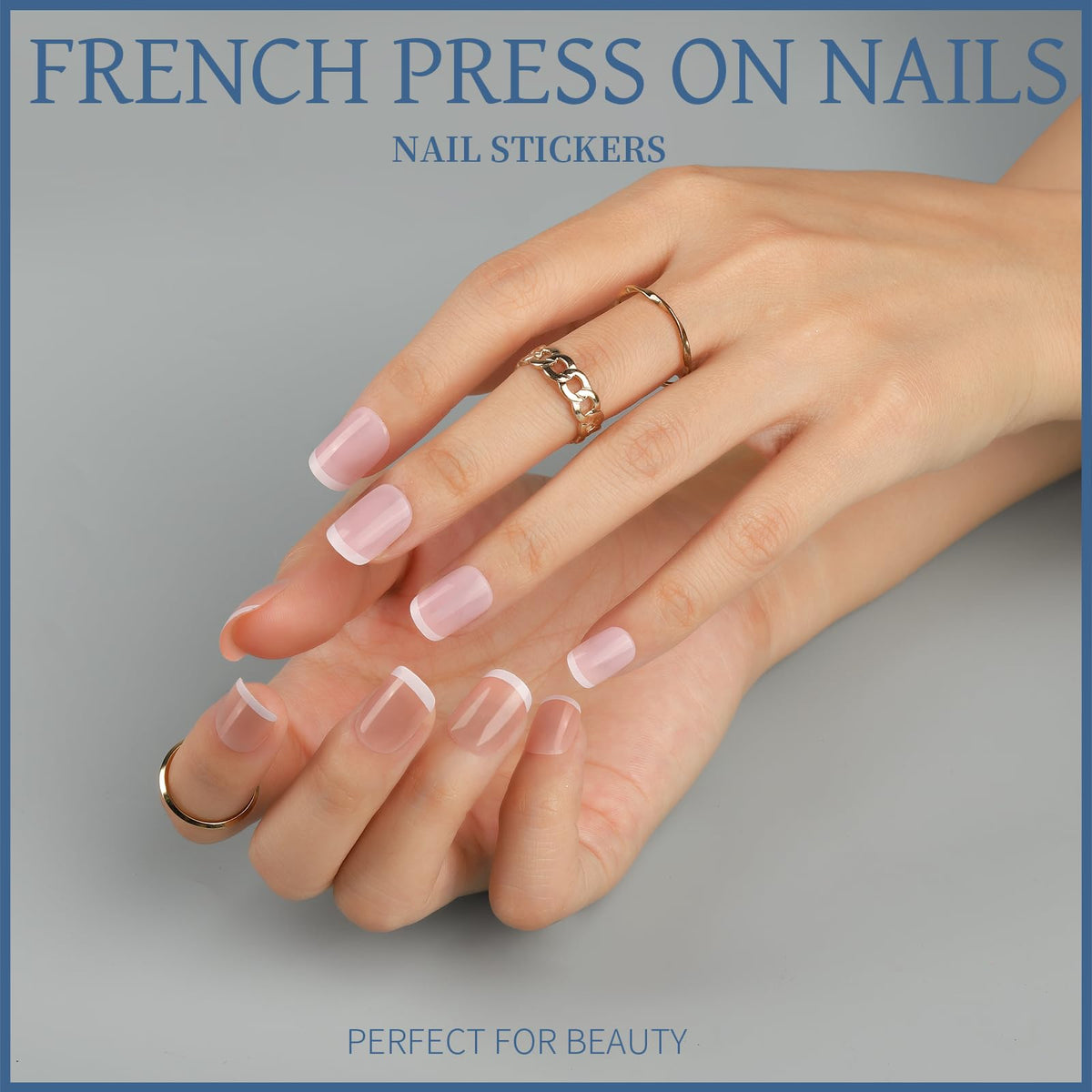 Teenitor nails applied on hand demonstrating size, short square shape and natural look