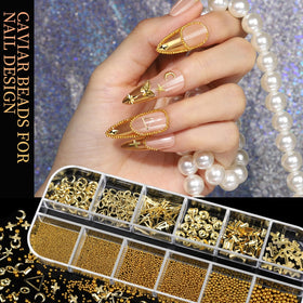 Teenitor manicure in use with gold charms creating camera-ready nails
