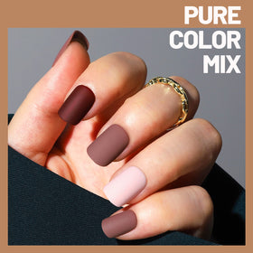 Teenitor lifestyle image of woman wearing mixed matte and glitter nails