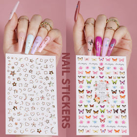 Teenitor nail stickers and rose charms spread for quick DIY embellishments and style options