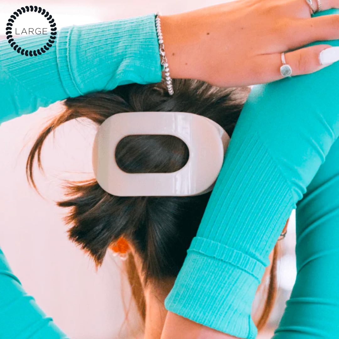 TELETIES next to hand showing large size and capacity for thick hair