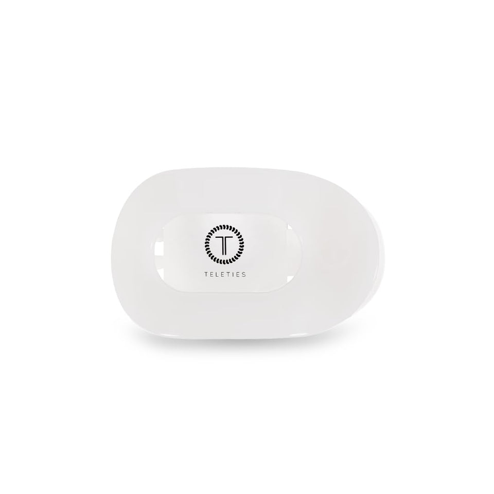 TELETIES flat round clip front view showing clean coconut white finish and strong grip