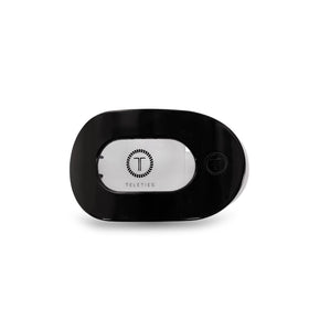 TELETIES flat round front view showing sleek jet black finish and comfortable curve