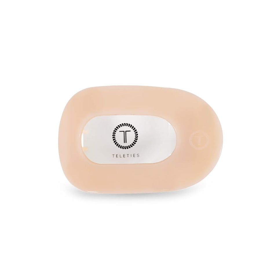 TELETIES front packaging almond beige showing clip and brand, durable everyday benefit
