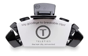 TELETIES large hair clip front view showing sleek jet black finish and secure hold