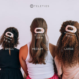 TELETIES held in hand for scale, illustrates medium size and coverage