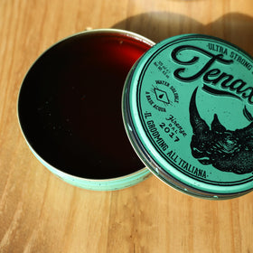 Tenax 4.5 ounce jar next to ruler to show compact travel-friendly size