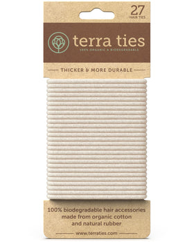 Terra Ties front packaging showing 27 biodegradable blonde hair ties and eco benefit