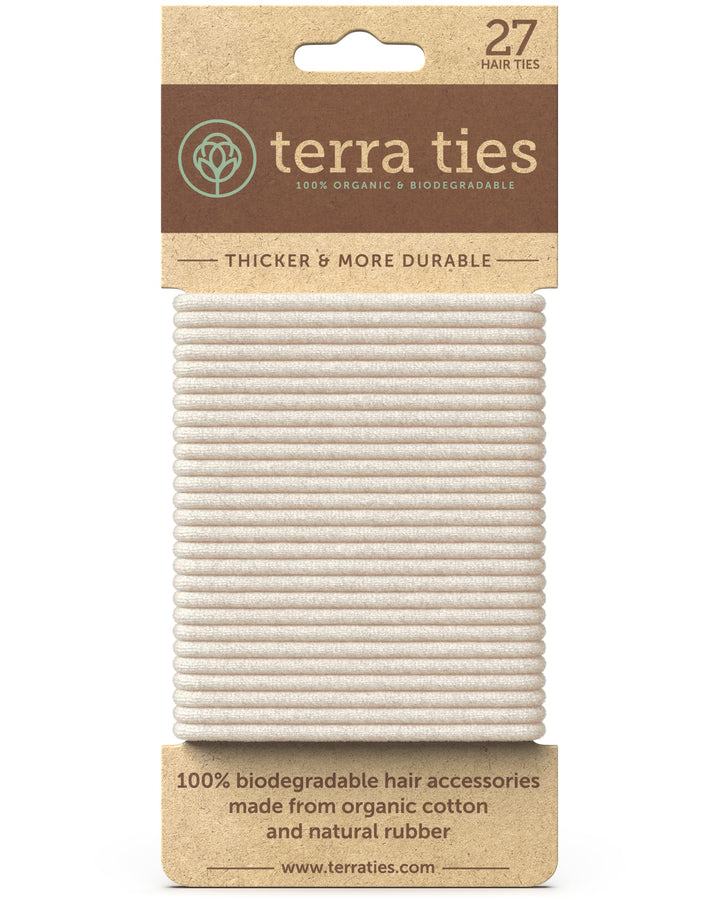 Terra Ties front packaging showing 27 biodegradable blonde hair ties and eco benefit