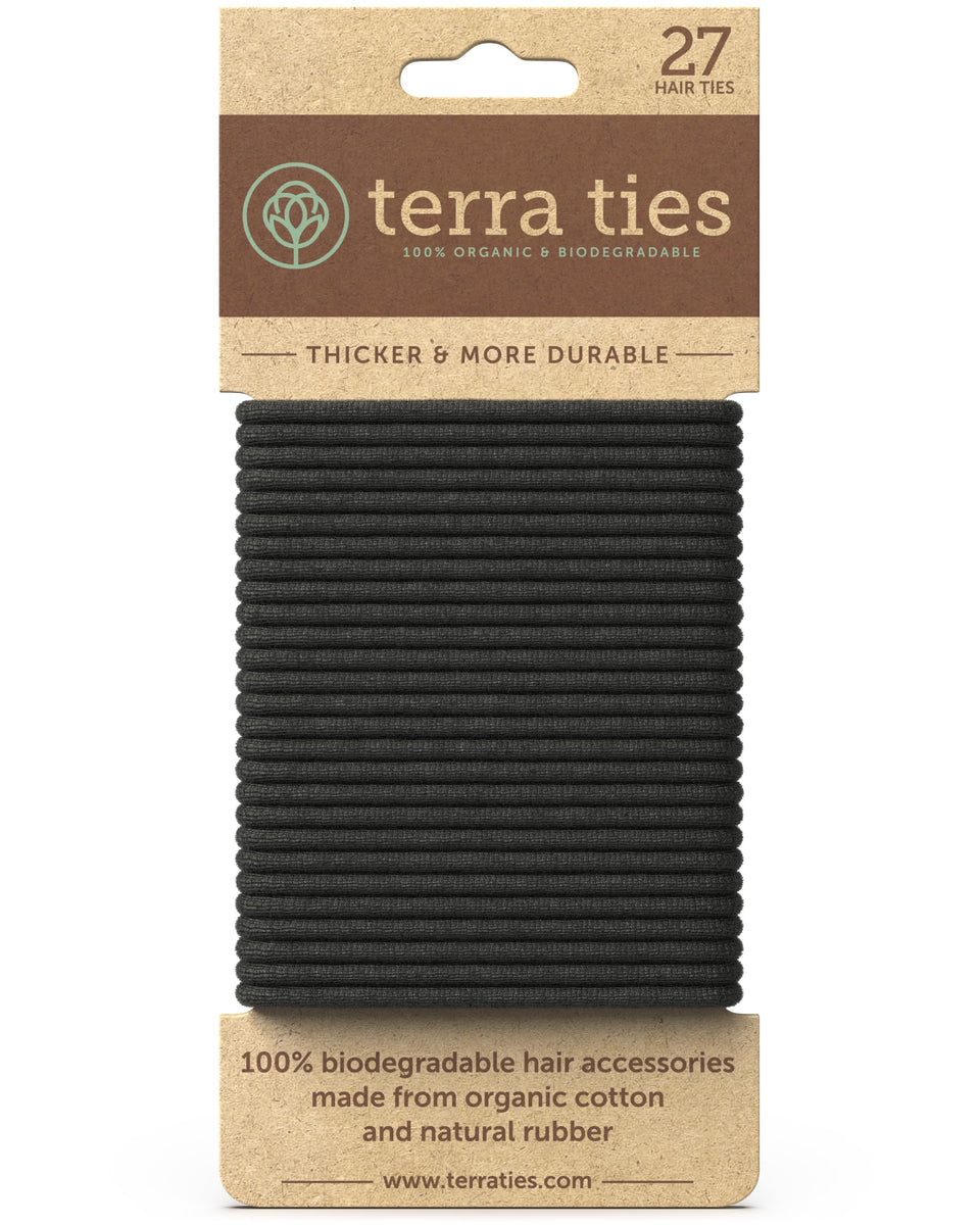 Terra Ties front packaging showing 27 biodegradable black hair ties, eco-friendly benefit