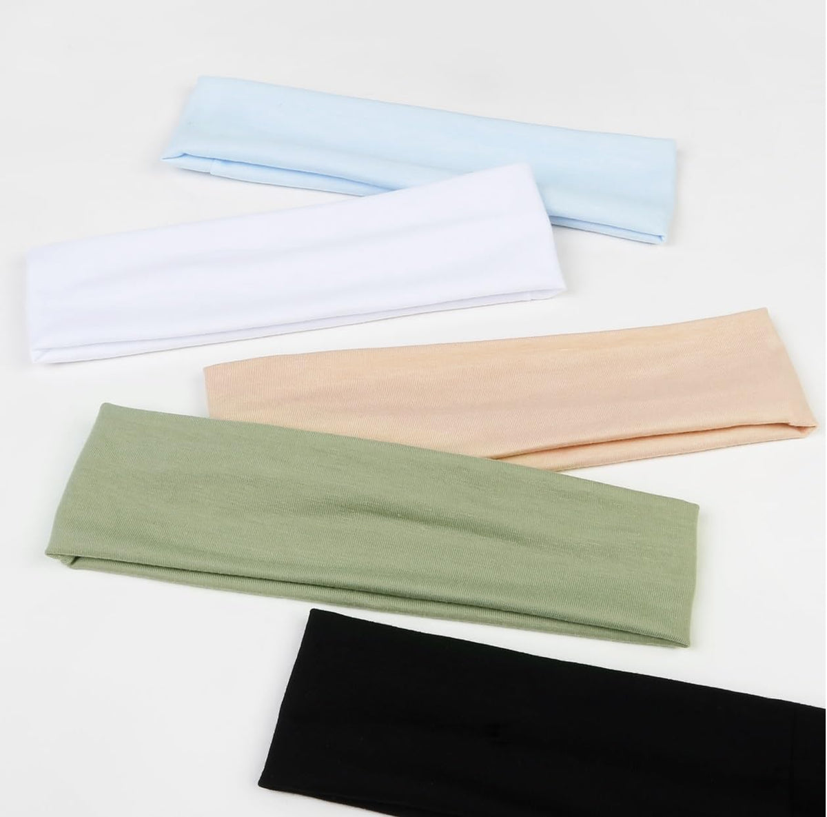 TERSE headband worn by woman running, showing sweat-wicking benefit