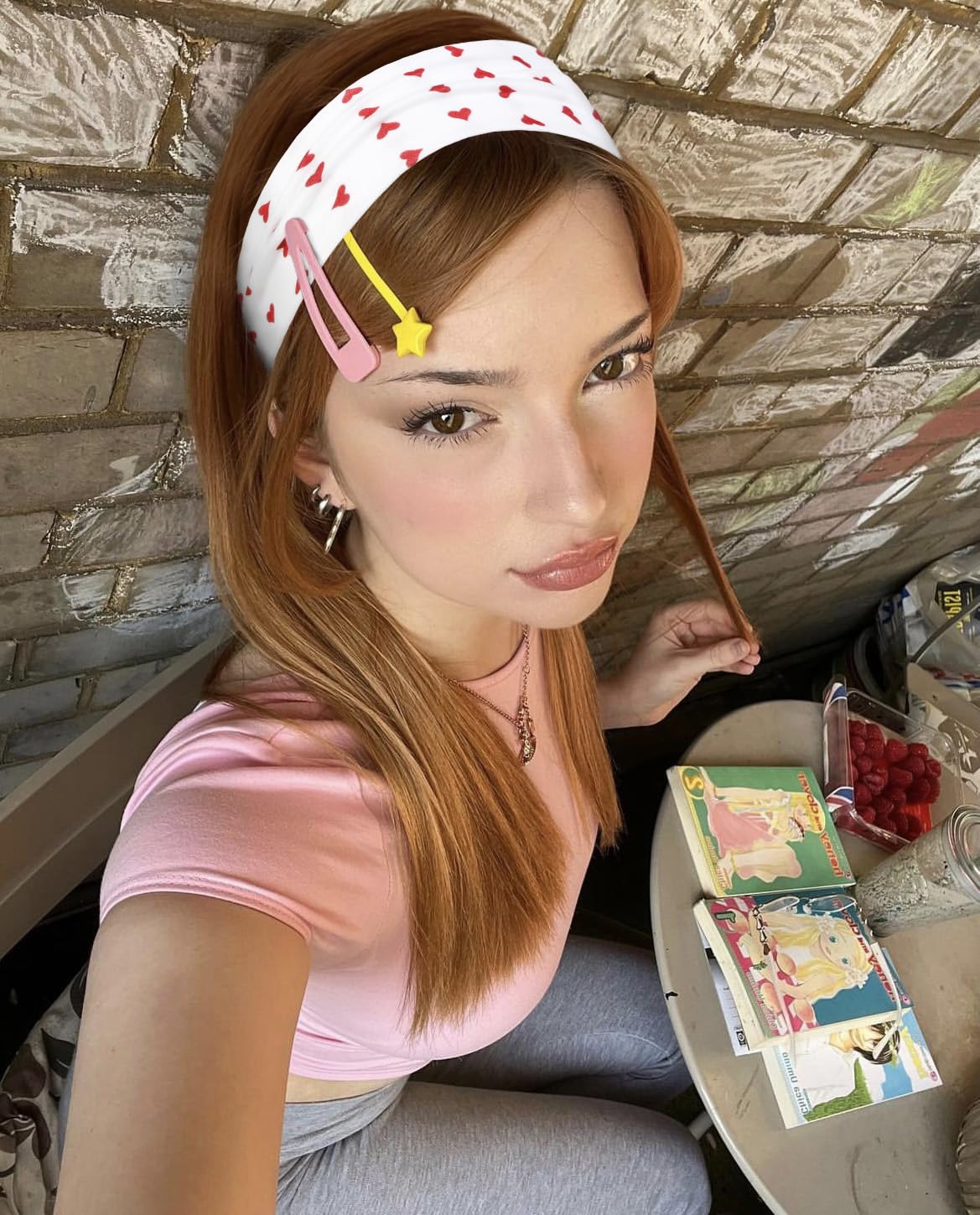 TERSE headband next to ruler showing 2.25 inch width for reliable hair coverage