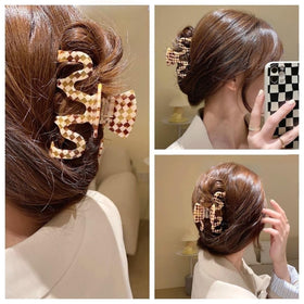 Textention clip worn in half-up hairstyle demonstrating secure, comfortable hold