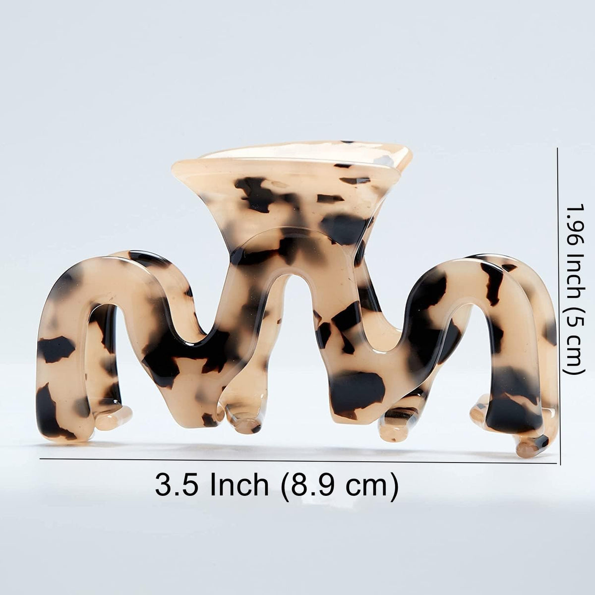 Textention clip in beach setting showing lightweight, everyday styling convenience