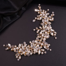 Teyglen gold headband front view showing elegant floral design and secure fit