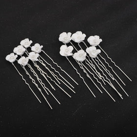 Teyglen decorative pins styled in an updo adding subtle sparkle