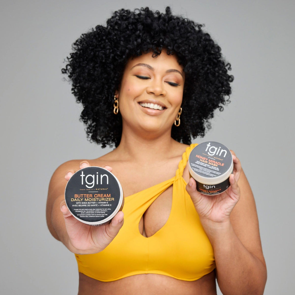 tgin duo applied to damp hair demonstrating easy application and slip