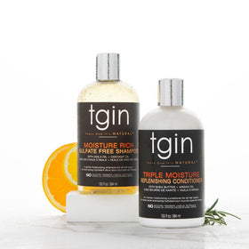 tgin product in use on curly hair showing easier detangling