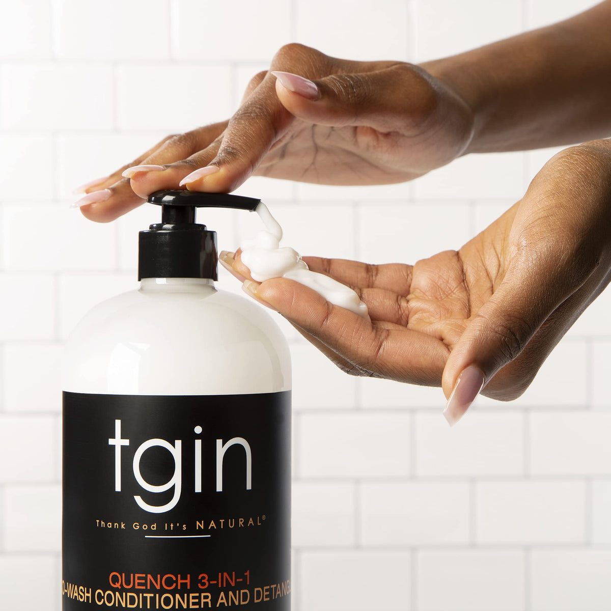 tgin being applied in shower to cleanse and detangle hair