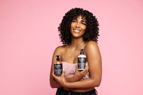 tgin creamy conditioner texture on hand showing slip and hydration for easier detangling