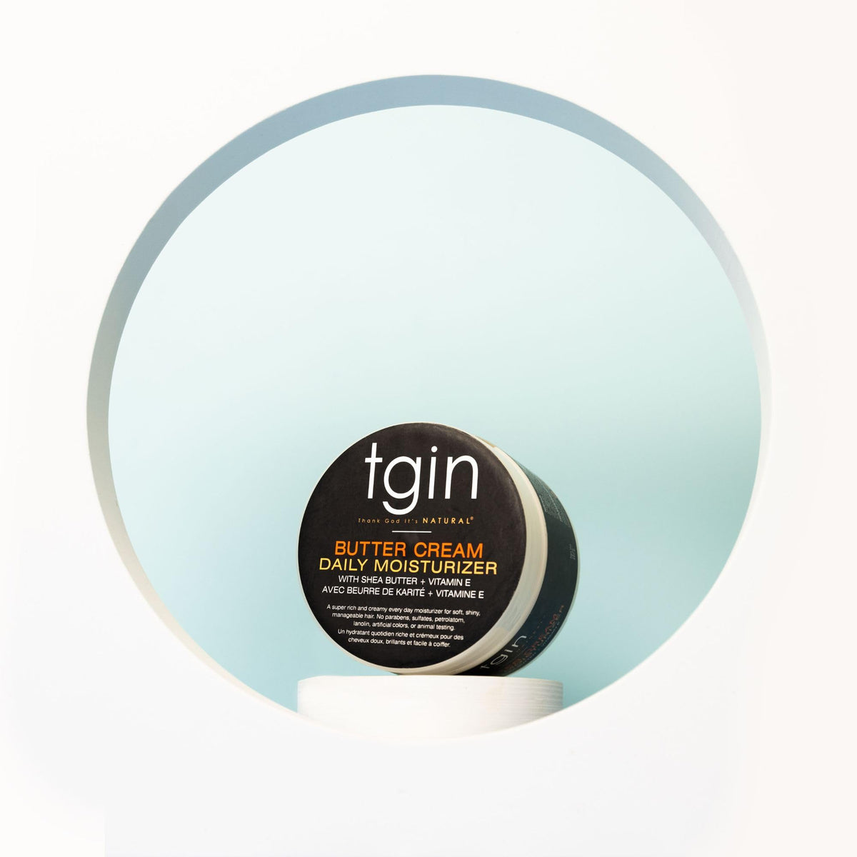 tgin products beside a hand for scale and clear size expectation