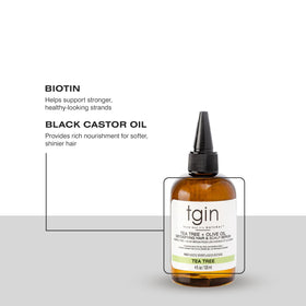 tgin bottle on bathroom counter suggesting daily scalp care routine