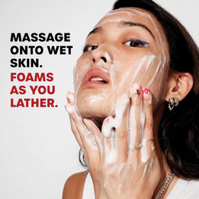 THAYERS pouring cleanser onto palm demonstrating easy application and lather