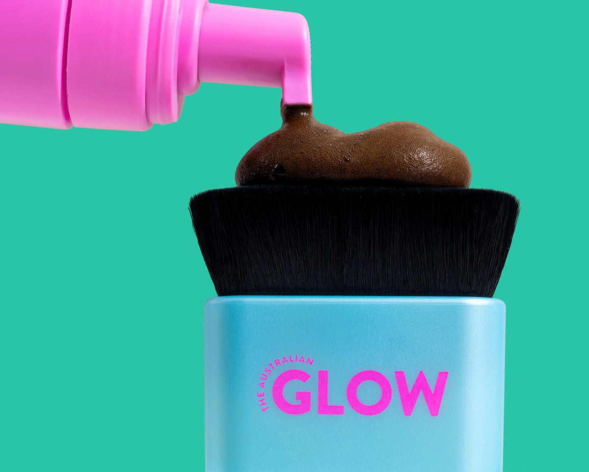 THE AUSTRALIAN GLOW in a beach bag suggesting travel-ready, quick tanning