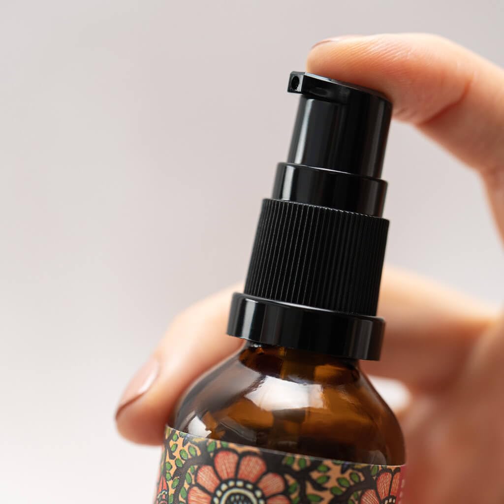 The Ayurveda Experience Yauvari key botanicals turmeric and vetiver displayed to highlight natural origins