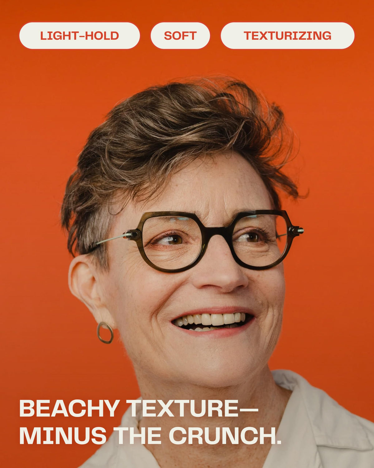 The Barb Shop bottle in hand illustrating 4 oz travel-friendly size benefit