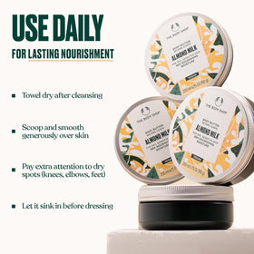 Lifestyle shot of The Body Shop Almond Milk Body Butter on a bathroom shelf conveying daily routine and comforting ritual
