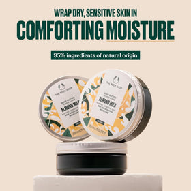 Close-up of The Body Shop Almond Milk Body Butter texture that highlights creamy, spreadable consistency for smooth skin