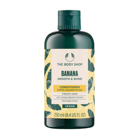 The Body Shop banana conditioner front packaging showing bottle and label benefits