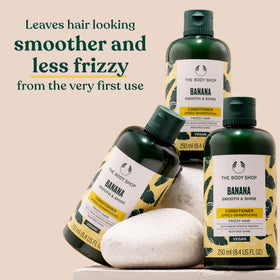 The Body Shop banana conditioner open cap revealing creamy texture for easy application