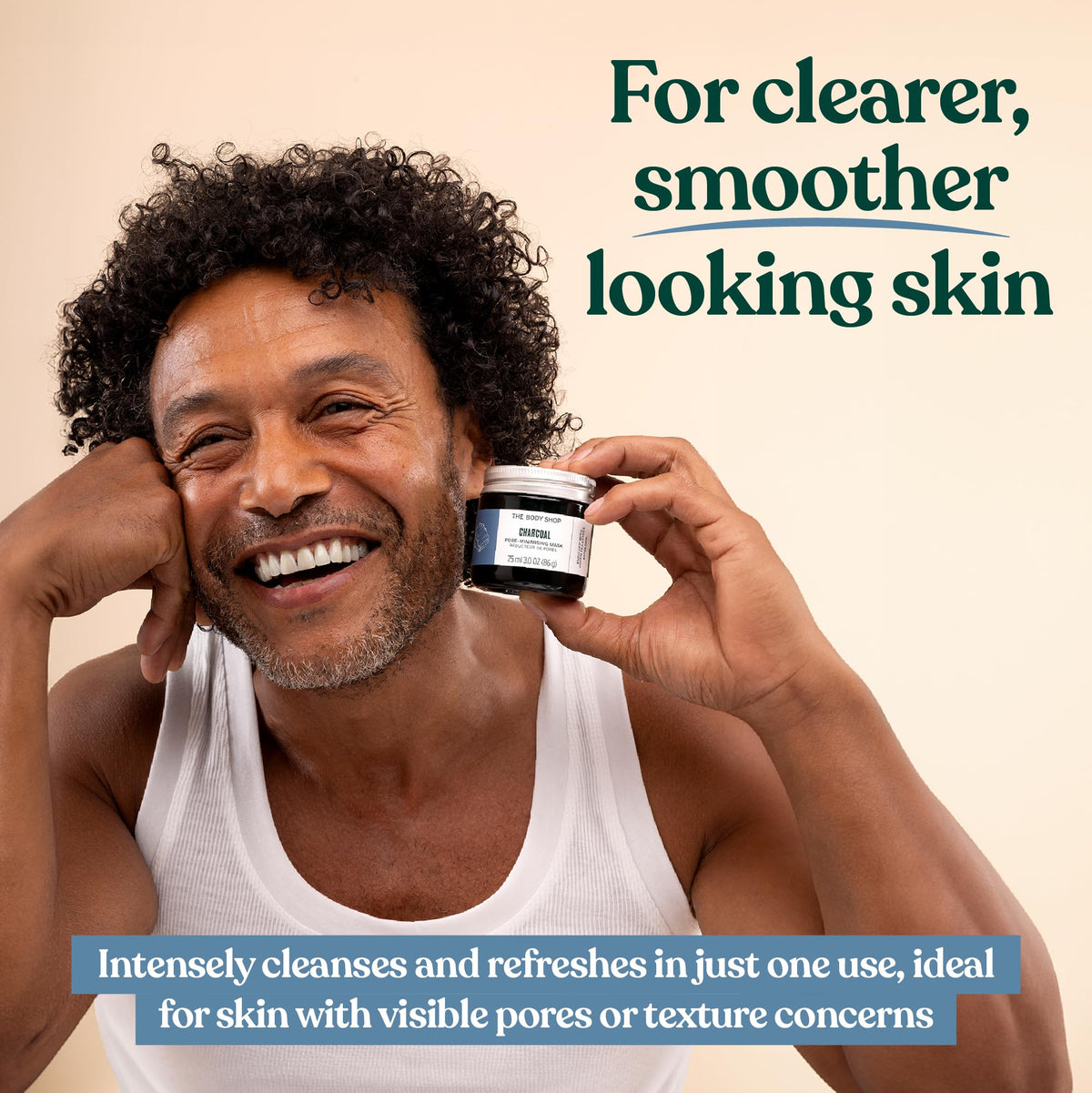 The Body Shop charcoal mask 75 ml beside ruler for scale showing compact size benefit travel-friendly