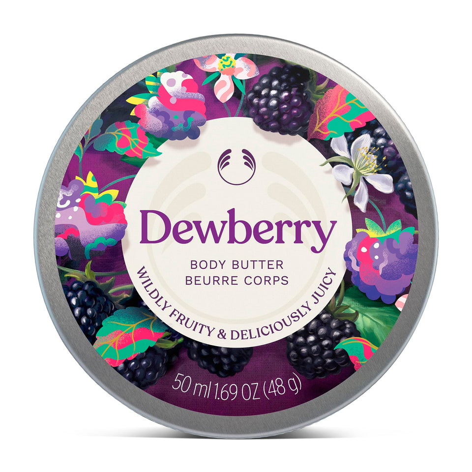 The Body Shop tin front view showing dewberry scent and compact size for travel