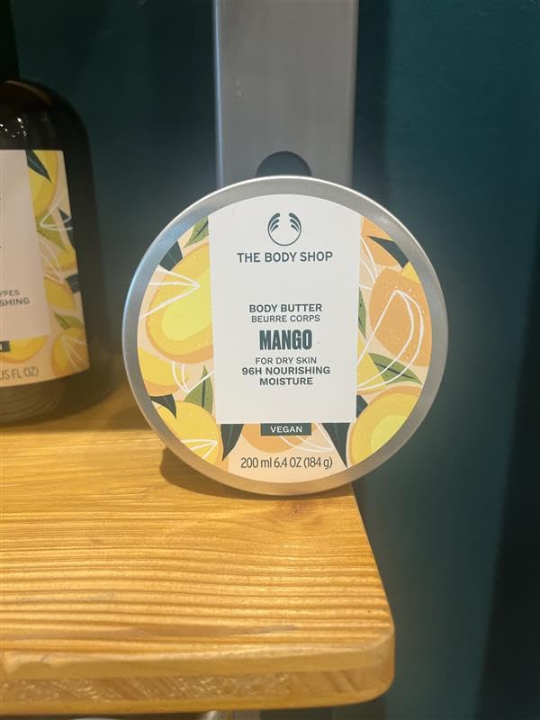 Morning bathroom scene with The Body Shop mango body butter in skincare routine