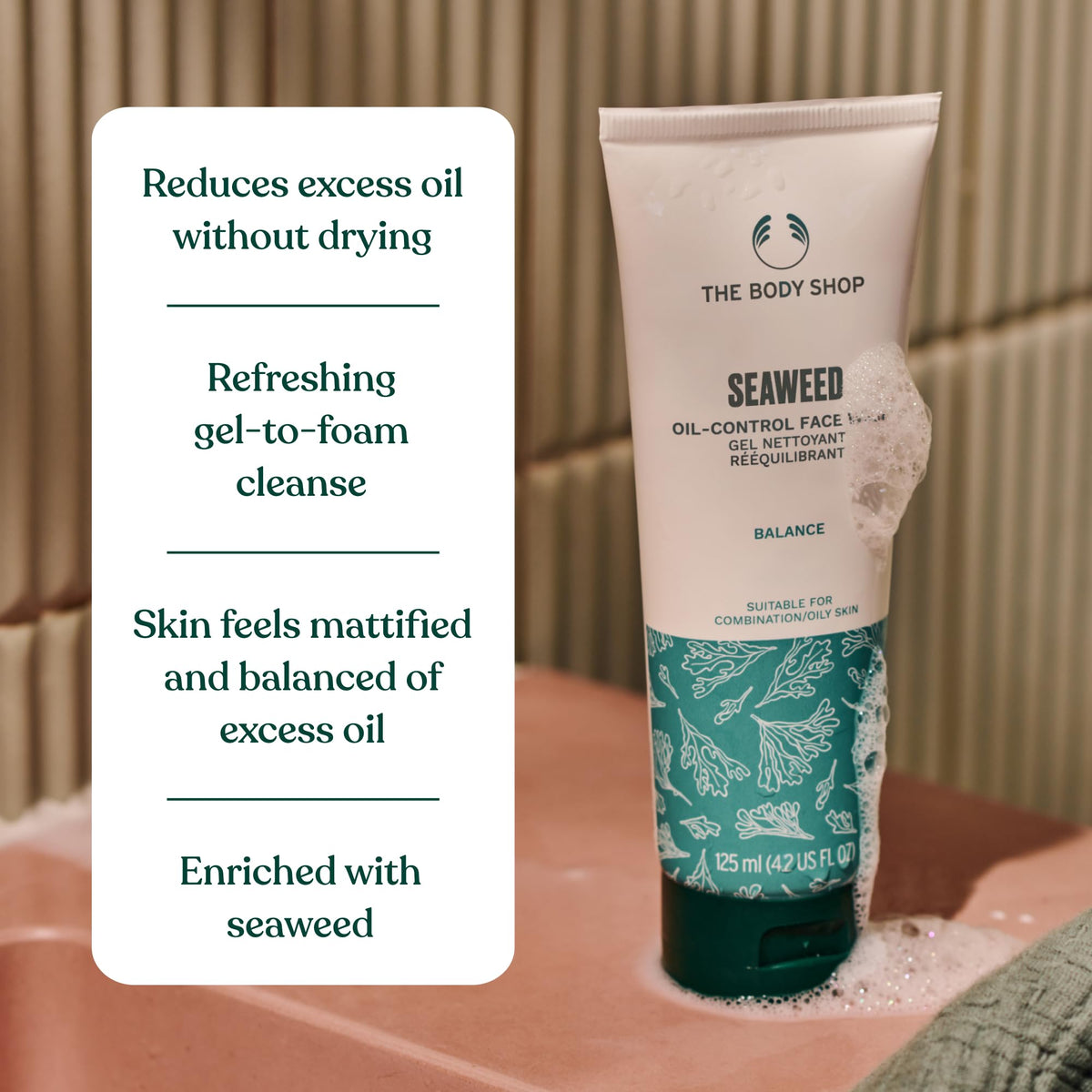 125ml tube held in hand for scale showing The Body Shop travel-friendly size benefit