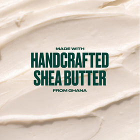 Apply The Body Shop shea body butter onto hand demonstrating smooth application and non-greasy finish