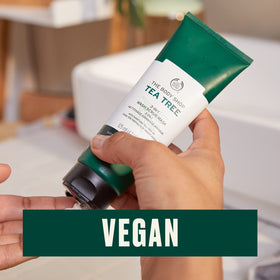 The Body Shop applying mask on model’s cheek to show clarifying effect and mattifying finish