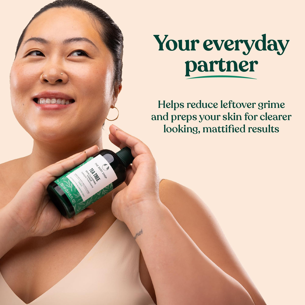 The Body Shop toner on a cotton pad removing impurities for purified skin