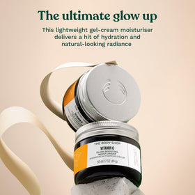 The Body Shop open jar top view highlighting smooth cream texture